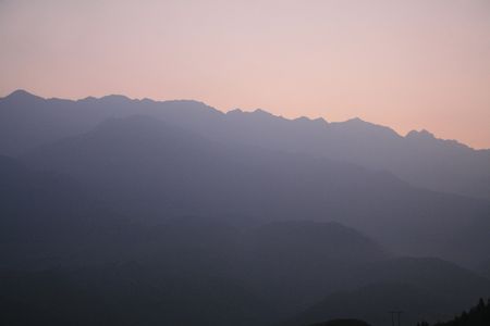 Sunset over the mountains in Sapa Vietnamの写真素材