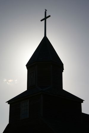 Silhouette of church tower on Lemuy island, Chiloé, Chileの写真素材