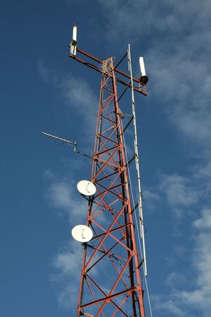 GSM reception pylon in front of a blue sky