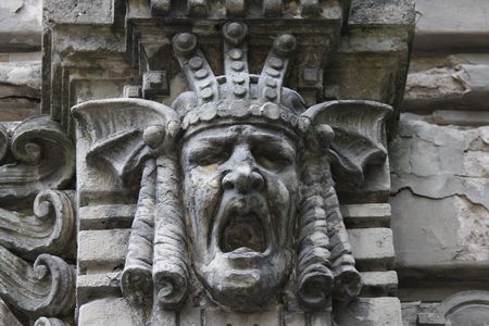 Face sculpture detail on famous Jugendstil (Art Nouveau) house in Riga, Latvia.The house was built in 1905 by architect Mikhail Eisensteinの写真素材