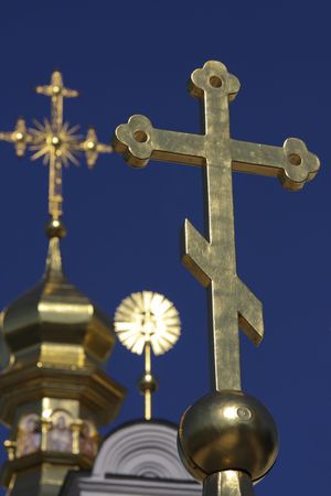 Golden cross on Upper Lavra orthodox church in Kievの写真素材