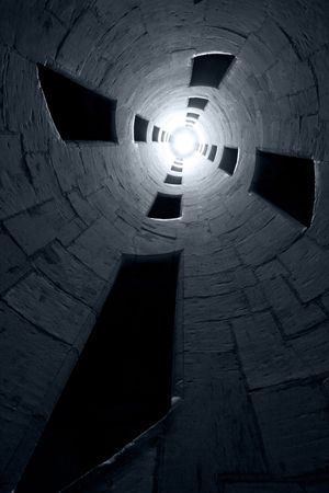 Light at the end of the tunnel. Blue-toned monochromeの写真素材