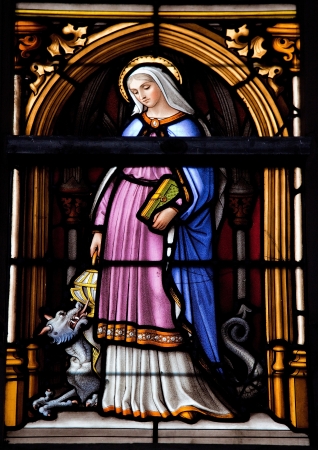 Saint Gudula, stained glass window in the Saint Michael and Saint Gudula cathedral of Brussels, Belgium.のeditorial素材