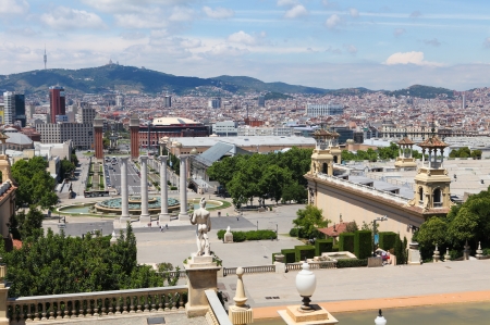 Barcelona, Spain - June 6, 2011  A view from the Mirador del Palau Nacional on the Placa d Espanya in Barcelona, with people and cars passing by のeditorial素材