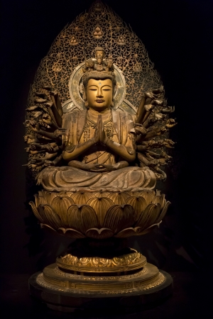 TOKYO - NOVEMBER 13: Ancient Buddha statue in a temple in Tokyo, on November 13, 2012. のeditorial素材