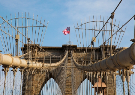 US flag on Brooklyn Bridge, New York Cityの写真素材