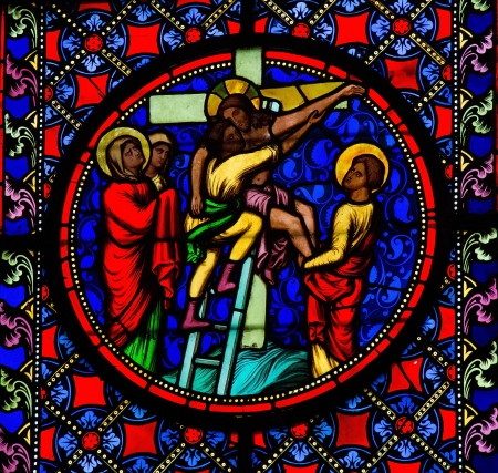 Stained Glass window depicting Jesus taken from the cross, in Bayeux, Calvados, France のeditorial素材