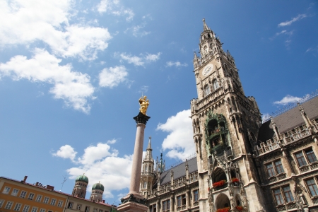 Neues Rathaus, the new town hall, and the column of Saint Mary, on the Marienplatz in the old town of Munich, capital of Bavaria, Germany  All visible statues and inscriptions were created more than 100 years ago, no property release is required の写真素材