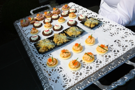 Tray with appetizers at a wedding receptionの写真素材