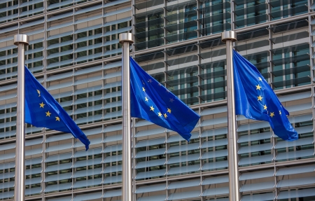 European flags in front of the Berlaymont building, headquarters of the European commission in Brussels.の写真素材