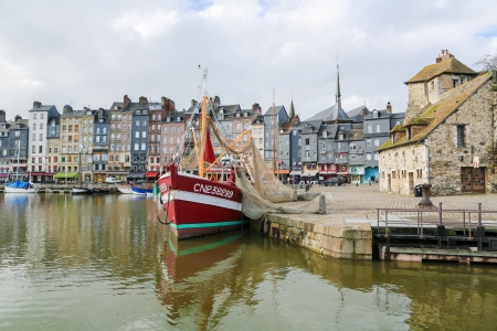 HONFLEUR, FRANCE - FEB 11: View on the old harbor of Honfleur, Calvados, France, on February 11, 2012. This town is a famous sight of Normandy and known for its picturesque port.のeditorial素材