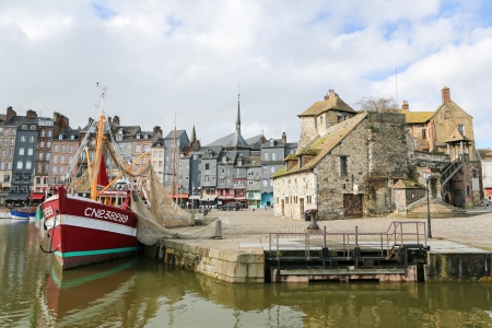 HONFLEUR, FRANCE - FEB 11: View on the old harbor of Honfleur, Calvados, France, on February 11, 2012. This town is a famous sight of Normandy and known for its picturesque port.のeditorial素材