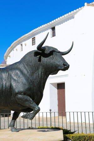 Statue of a bull in front of the arena of Ronda, in Malaga province, Andalusia, Spain, on December 1, 2013 のeditorial素材