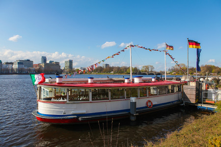 HAMBURG, GERMANY - APRIL 20, 2010: Boat at the artificial lake Binnenalster in the center of Hamburg, Germany.のeditorial素材