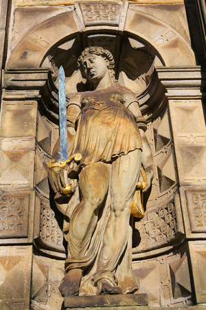 Statue of Lady Justice at the Old Town Hall of Leiden, The Netherlands. This statue is more than 200 years old, no property release required.の写真素材