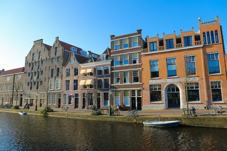 LEIDEN, THE NETHERLANDS - MARCH 16, 2014: The famous Old Rhine going through the center of Leiden, The Netherlands.のeditorial素材