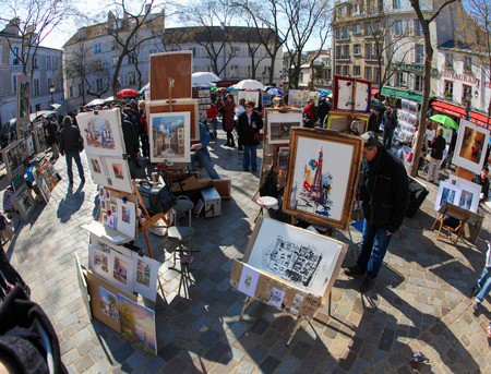 PARIS, FRANCE - March 6, 2011: Painters selling their work on the famous Place du Tertre in Montmartre, Paris, France.のeditorial素材