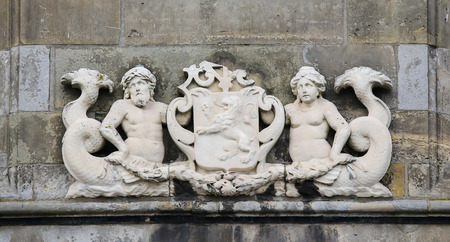 Coat of arms of the former island Schouwen, in Zierikzee, Schouwen-Duiveland, Zeeland province, the Netherlands. This sculpture was created more than 200 years ago, no property release is required.の写真素材