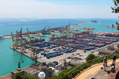 BARCELONA, SPAIN - JUNE 6, 2011: View on the container port from Montjuic in Barcelona, Catalonia, Spain.のeditorial素材