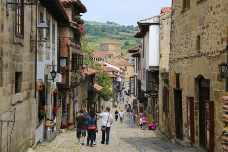 SANTILLANA DEL MAR, SPAIN - JULY 13, 2014: Street with typical architecture in Santillana del Mar, a famous historic town in Cantabria, Spain.のeditorial素材