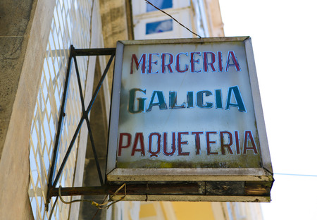 Old typical sign of a merceria (haberdashery) in the historic town Betanzos, Galicia, Spain.のeditorial素材