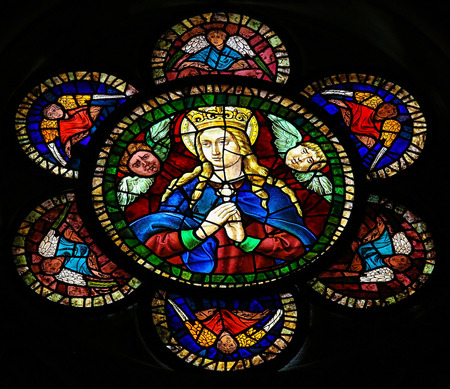 Stained glass window depicting Mother Mary in the cathedral of Leon, Castille and Leon, Spain.