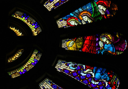 VIANA DO CASTELO, PORTUGAL - AUGUST 4, 2014: Stained glass window depicting praying angels in the church of Viana do Castelo, Portugal.のeditorial素材