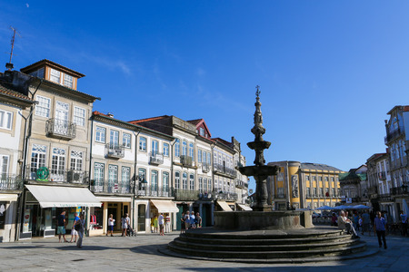 VIANA DO CASTELO, PORTUGAL - AUGUST 4, 2014: Famous Chafariz Fountain and old Town Hall at the Praca da Republica in Viana do Castelo, Portugal.のeditorial素材