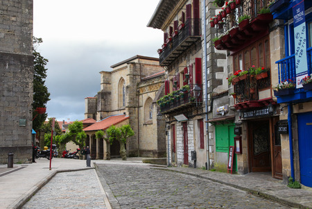 HONDARRIBIA, SPAIN - MAY 26, 2014: Houses at the Plaza Arma in the Port Area in Hondarribia, a town in Gipuzkoa, Basque Country, Spain, near the French border.のeditorial素材