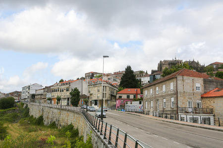 TUI, SPAIN - AUGUST 2, 2014: View on the center and the Romanesque Cathedral (11th-13th Century) of Saint Mary in Tui, Galicia, Spain.のeditorial素材