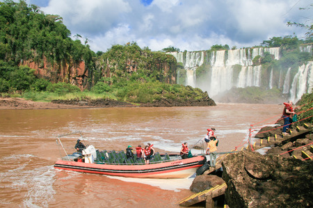 IGUAZU, ARGENTINA - MAY 4, 2008: Unidentified tourists at the Iguazu falls on the border of Argentina and Brazilのeditorial素材