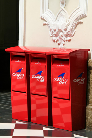 SANTIAGO, CHILE - MARCH 18, 2008: Red postal boxes in the Main Office of the National Post Service...
