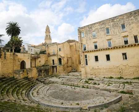 Roman Theatre and the tower of the Cathedral of Lecce, a historic city in Apulia, Southern Italyの写真素材