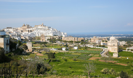View on the medieval old town of Ostuni in Puglia, South Italy.The center of Ostuni is known as the White Town or La Citta Bianca and a famous site in Italy.の写真素材