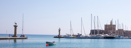 RHODES, GREECE - JUNE 12, 2015: Fort Saint Nicholas at the harbour in the city of Rhodes, Greece.