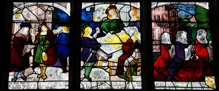 MORTAGNE-AU-PERCHE, FRANCE - JULY 20, 2015: Stained Glass depicting scenes in the life of Saint Anthony of Padua in the Notre Dame church of Mortagne, Perche, Franceのeditorial素材