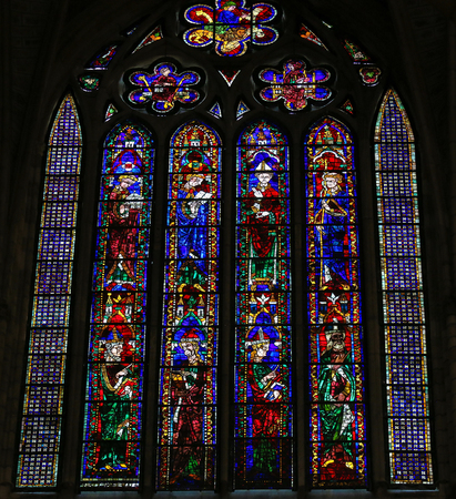 LEON, SPAIN - AUGUST 12, 2014: Stained Glass window depicting Catholic Saints in the Cathedral of Leon in Castile and Leon, Spain.のeditorial素材