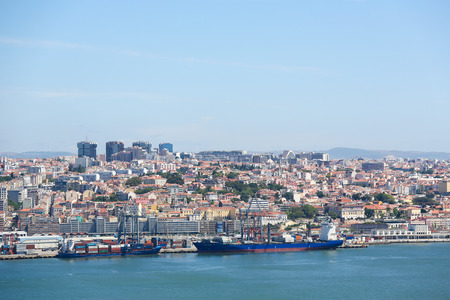 LISBON, PORTUGAL - JULY 11, 2016: View on container ships at the Port of Lisbon at the river Tagus in Portugalのeditorial素材