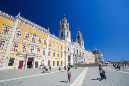 MAFRA, PORTUGAL - JULY 17, 2016: Facade of the Basilica at the Palace of Mafra, Portugal, a famous royal palace built in the 18th Century.のeditorial素材