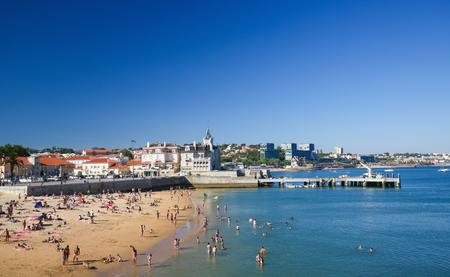 CASCAIS, PORTUGAL - JULY 15, 2016: Famous beach in the Bay of Cascais, a Portuguese coastal town 30 km west of Lisbon.のeditorial素材