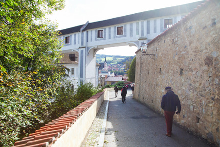 Unidentified tourists walking towards the center of Cesky Krumlov, South Bohemia, Czech Republic.のeditorial素材