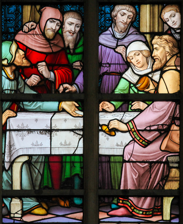 Stained Glass depicting the legend of Jews stealing sacramental bread, in the Cathedral of Brussels, Belgium. This antisemitic legend dates back to 1370.のeditorial素材