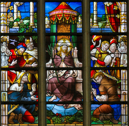 Stained Glass window depicting Jesus Christ on Good Friday in the Cathedral of Saint Bavo in Ghent, Flanders, Belgium.のeditorial素材