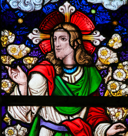 Stained Glass window depicting Jesus Christ in the Cathedral of Saint Bavo in Ghent, Flanders, Belgium.のeditorial素材