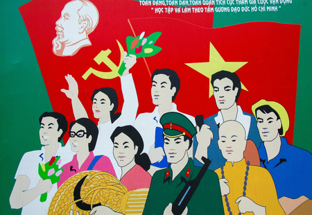 Communist wallpainting depicting revolutionaries in front of the Vietnamese flag at the Independence Palace in Ho Chi Minh City, Vietnamのeditorial素材