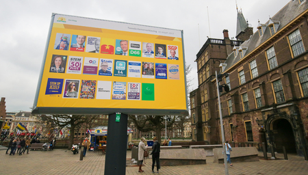 Board with the election posters of all Dutch political parties at the Binnenhof in The Hague, the Netherlandsのeditorial素材