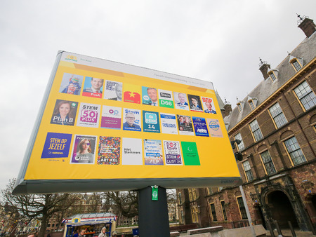 Board with the election posters of all Dutch political parties at the Binnenhof in The Hague, the Netherlandsのeditorial素材