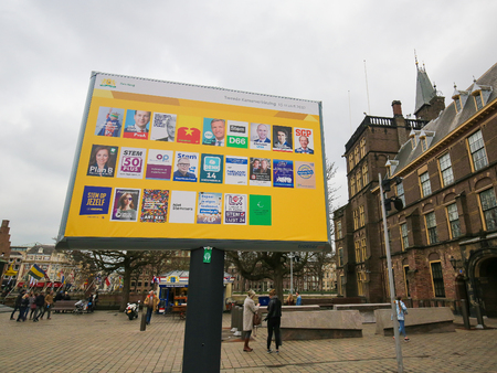 Board with the election posters of all Dutch political parties at the Binnenhof in The Hague, the Netherlandsのeditorial素材
