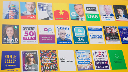Board with the election posters of all Dutch political parties at the Binnenhof in The Hague, the Netherlandsのeditorial素材
