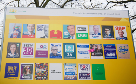 Board with the election posters of all Dutch political parties at the Binnenhof in The Hague, the Netherlandsのeditorial素材